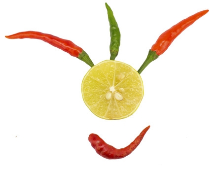 Chili and lime on white backgroundの写真素材