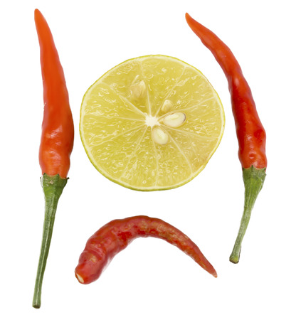 Chili and lime on white backgroundの写真素材