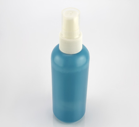 Blue plastic bottle isolated on whiteの写真素材