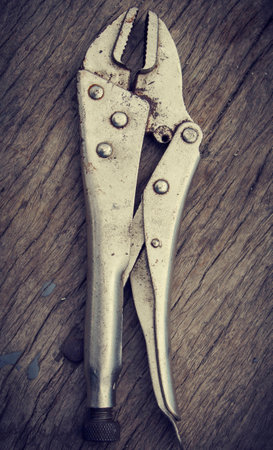 wrench on the wood backgroundの写真素材