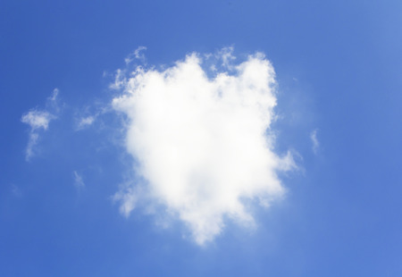 Heart shaped cloud on the skyの写真素材