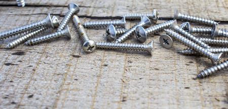 Screws located on wooddenの写真素材