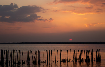 Colorful sunset over water surface.の写真素材