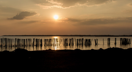 Colorful sunset over water surface.の写真素材
