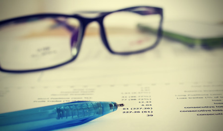 Business concept,Image focus pen and number on paperの写真素材