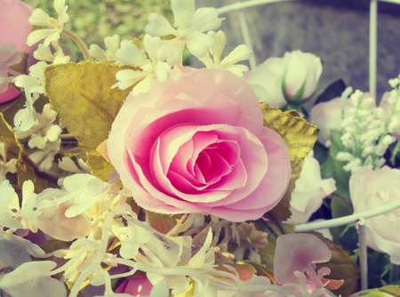 Bouquet fake roses, Plastic roses retro toneの写真素材