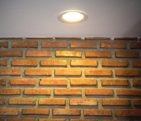 lamp of the shined brick wallの写真素材