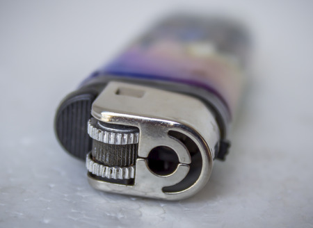 cigarette lighter. Isolated on white.の写真素材