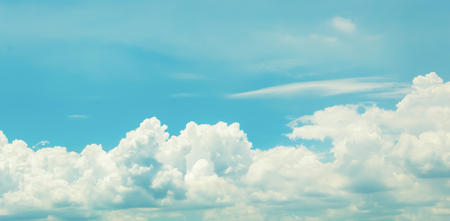 clouds in the blue sky backgroundの写真素材