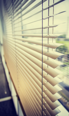 venetian blinds by the windowの写真素材