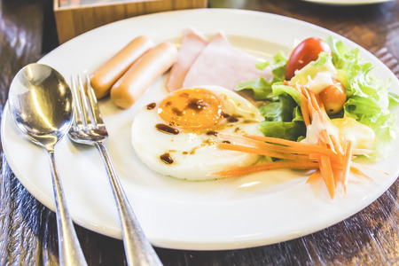 breakfast with egg on tableの写真素材