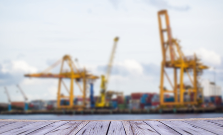 Large harbor cranes loading container shipsの写真素材