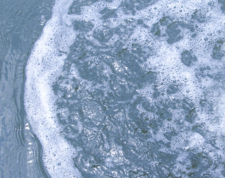 Foam from wave,white water for backgroundの写真素材