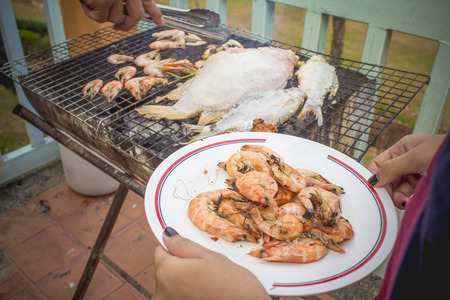 Barbecue Grill cooking fresh seafoodの写真素材