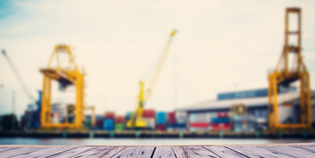 Large harbor cranes loading container shipsの写真素材
