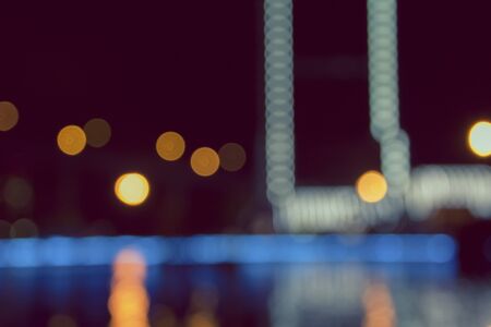 Neon abstract city night bokeh backgroundの写真素材