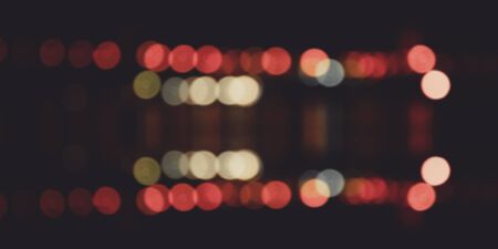 Neon abstract city night bokeh background