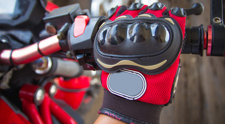Hand rider on handlebars, close-up Motorcycle Racing Glovesの写真素材