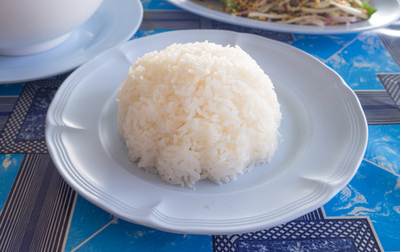 Cooked rice in a  dish on tableの写真素材
