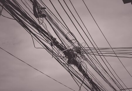 Electric wires with sky backgroundの写真素材