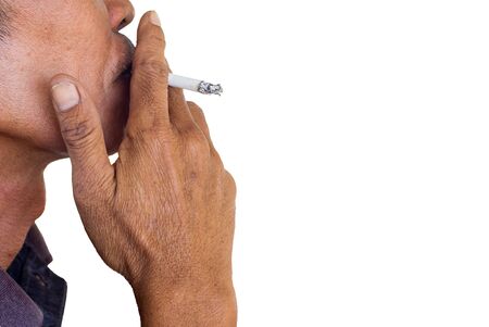 Male smoking a cigarette  isolated on white backgroundの写真素材