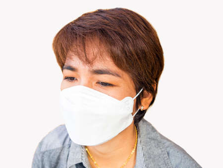 Asian women wearing masks are sick,Coronavirus covid-19 concept, Unhealthy Asian woman sneezing and cough without protective face maskの写真素材