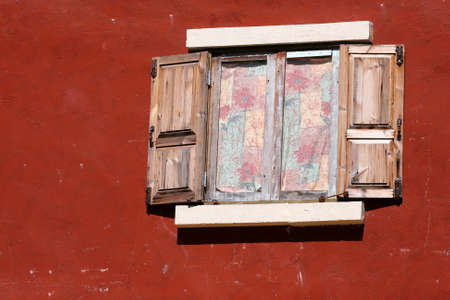 vintage window on crimson red wall