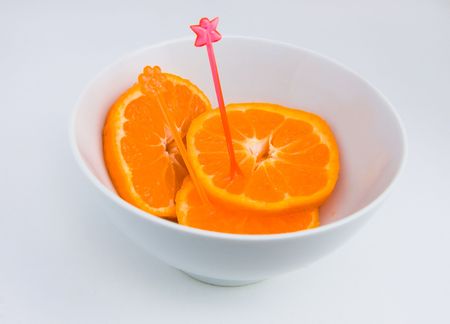 Mandarin segments in wite bowl , natural helpful tasty dessert の写真素材