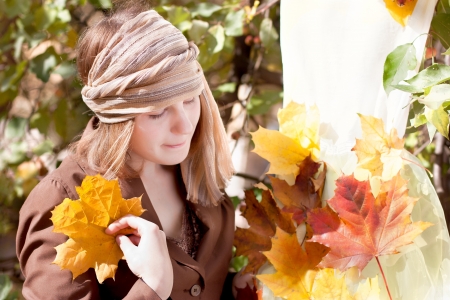 woman making a dress for fallの写真素材