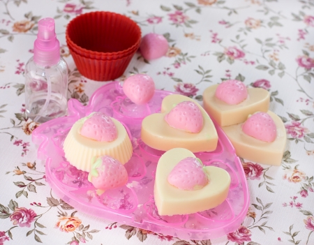 making handmade soaps with strawberriesの写真素材