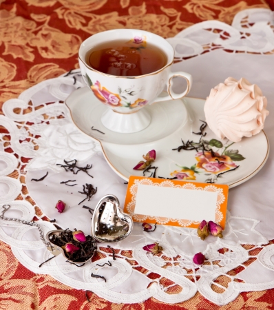 Rose Tea party with  marshmallows,brewing tea with rosebudsの写真素材