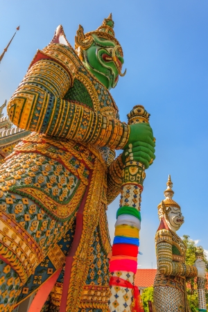 Green Face Giants at Wat Arun Bangkokの写真素材