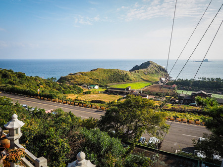 Jeju Island, KOREA - NOVEMBER 12: The tourist visited Sanbanggulsa temple that located on Sanbangsan Mountain. On the way to the cave, with the temple in it you have multiple buildings - 12 NOVEMBER 2016のeditorial素材