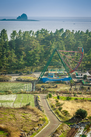Jeju Island, KOREA - NOVEMBER 12: The tourist visited Sanbanggulsa temple that located on Sanbangsan Mountain. On the way to the cave, with the temple in it you have multiple buildings - 12 NOVEMBER 2016のeditorial素材