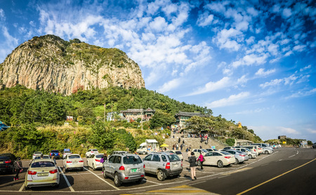 Jeju Island, KOREA - NOVEMBER 12: The tourist visited Sanbanggulsa temple that located on Sanbangsan Mountain. On the way to the cave, with the temple in it you have multiple buildings - 12 NOVEMBER 2016のeditorial素材