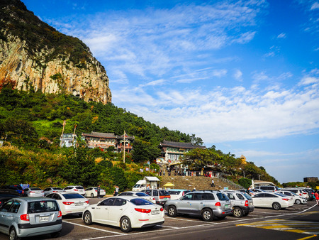 Jeju Island, KOREA - NOVEMBER 12: The tourist visited Sanbanggulsa temple that located on Sanbangsan Mountain. On the way to the cave, with the temple in it you have multiple buildings - 12 NOVEMBER 2016のeditorial素材