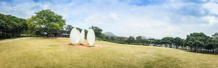 Panorama view of Osulloc tea museum garden in blue sky backrround, the famous green tea museum in Jeju, South Koreaのeditorial素材