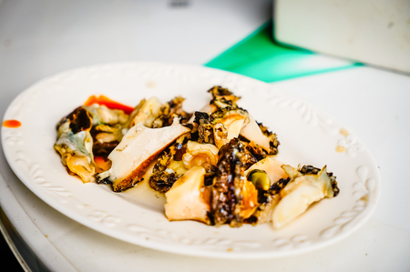 Set of raw seafood served to customer that ready to eat in raw seafood shop near Seongaksan mountain, Jeju island, South Korea.の写真素材