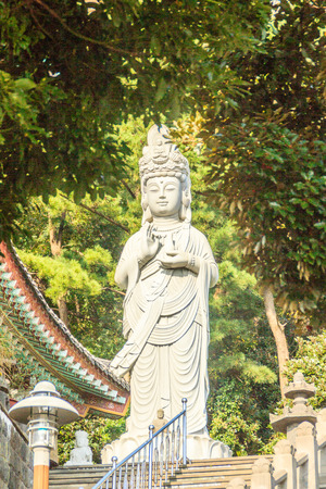 Stone statue of Gwanseeum-bosal at Sanbangsa Temple. Also known as Guanyin or Guanshiyin , is the Goddess of mercy, influenced from Chinese folk religion. Widely worship in the East & South East Asiaの写真素材