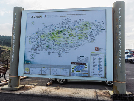 The tourist visited Seongaksan coast, the famous coastal drive with breathtaking scenic views in Jeju islandの写真素材