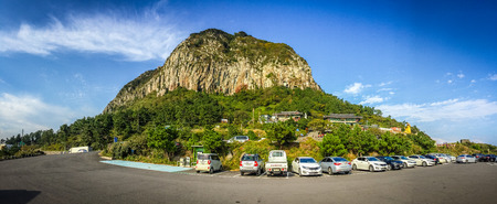 Jeju Island, KOREA - NOVEMBER 12: The tourist visited Sanbanggulsa temple that located on Sanbangsan Mountain. On the way to the cave, with the temple in it you have multiple buildings - 12 NOVEMBER 2016のeditorial素材