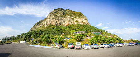 Jeju Island, KOREA - NOVEMBER 12: The tourist visited Sanbanggulsa temple that located on Sanbangsan Mountain. On the way to the cave, with the temple in it you have multiple buildings - 12 NOVEMBER 2016のeditorial素材