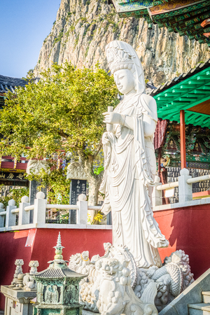 Stone statue of Gwanseeum-bosal at Sanbangsa Temple. Also known as Guanyin or Guanshiyin , is the Goddess of mercy, influenced from Chinese folk religion. Widely worship in the East & South East Asiaのeditorial素材