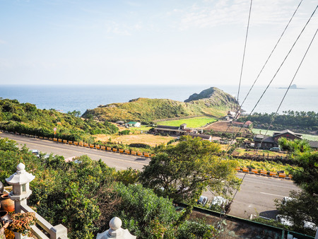 Jeju Island, KOREA - NOVEMBER 12: The tourist visited Sanbanggulsa temple that located on Sanbangsan Mountain. On the way to the cave, with the temple in it you have multiple buildings - 12 NOVEMBER 2016のeditorial素材