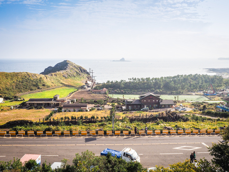 Jeju Island, KOREA - NOVEMBER 12: The tourist visited Sanbanggulsa temple that located on Sanbangsan Mountain. On the way to the cave, with the temple in it you have multiple buildings - 12 NOVEMBER 2016のeditorial素材