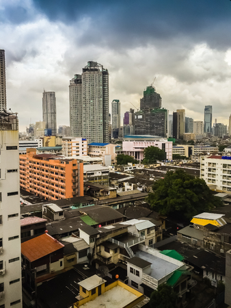 Skyline of big city full of skyscrapers in the business district of Bangkok, view from condominium in Petchburi Roadの写真素材