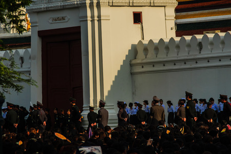 BANGKOK THAILAND - October 14, 2016 : Crowd of Thai people watch the royal procession transferring the body of the King, who passed away on October 13, 2016, at the Grand Palace, Bangkok., Thailand,のeditorial素材