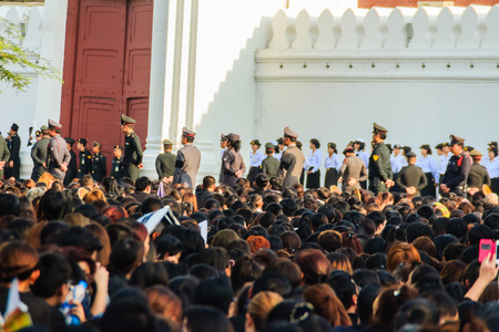 BANGKOK THAILAND - October 14, 2016 : Crowd of Thai people watch the royal procession transferring the body of the King, who passed away on October 13, 2016, at the Grand Palace, Bangkok., Thailand,のeditorial素材