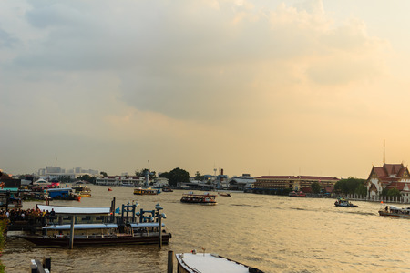 BANGKOK THAILAND - October 14, 2016 : Crowd of Thai people passenger boats at Maharaj Pier to watch the royal procession transferring the body of the King, who passed away on October 13, 2016, at the Grand Palaceのeditorial素材