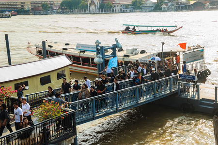 BANGKOK THAILAND - October 14, 2016 : Crowd of Thai people passenger boats at Maharaj Pier to watch the royal procession transferring the body of the King, who passed away on October 13, 2016, at the Grand Palaceのeditorial素材